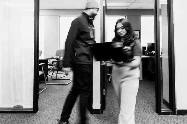 Adroit Technologies team and office workspace