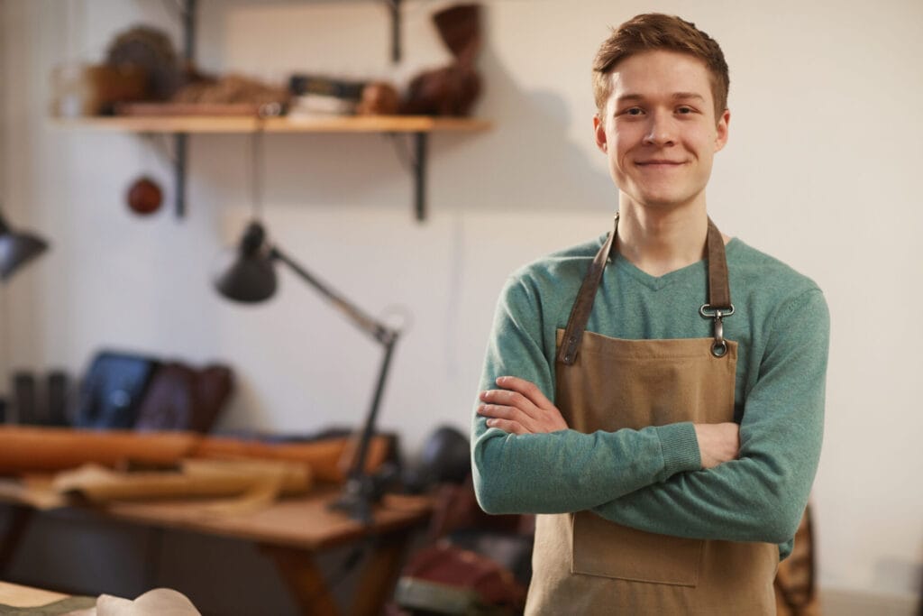 Cheerful Craftsman With Arms Crossed