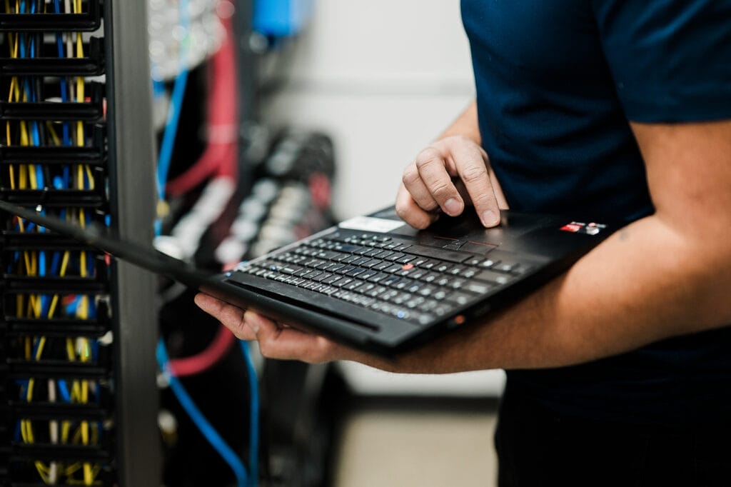 Adroit Technologies employee fixing servers